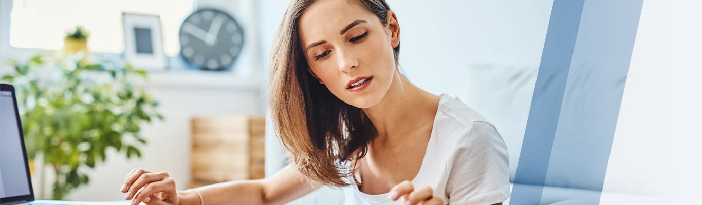 woman looking at paperwork