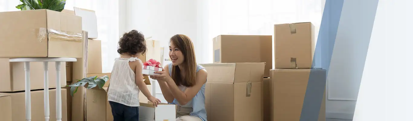 Mother and daughter with moving boxes