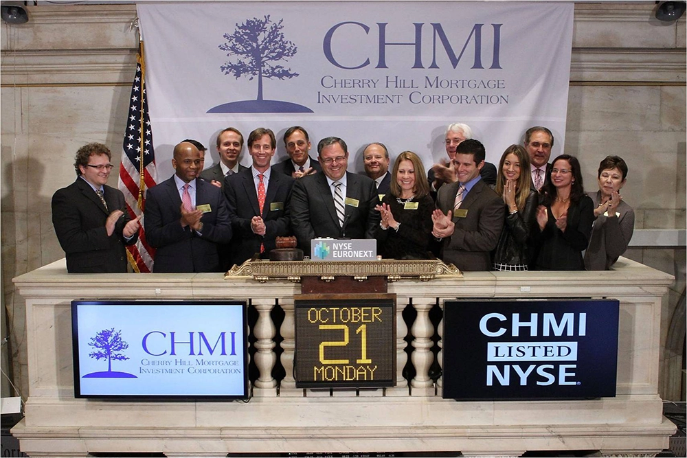 Stan ringing the Opening Bell in 2013 for the public equity offering of Cherry Hill Mortgage Investment Corporation (CHMI), which trades today on the New York Stock Exchange.