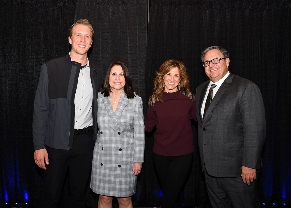 Stan and Roslyn with Nick Foles, former Philadelphia Eagles quarterback, as well as Suzy Kolber, former ESPN sports anchor and reporter