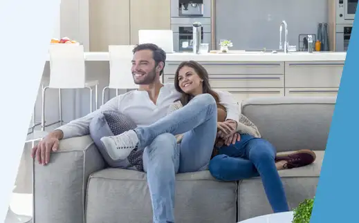 Couple installing lights in their home.