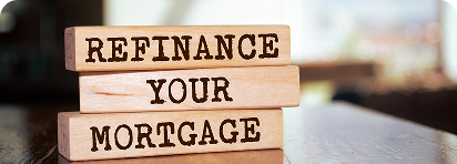 photo of family with home cardboard lifted above
